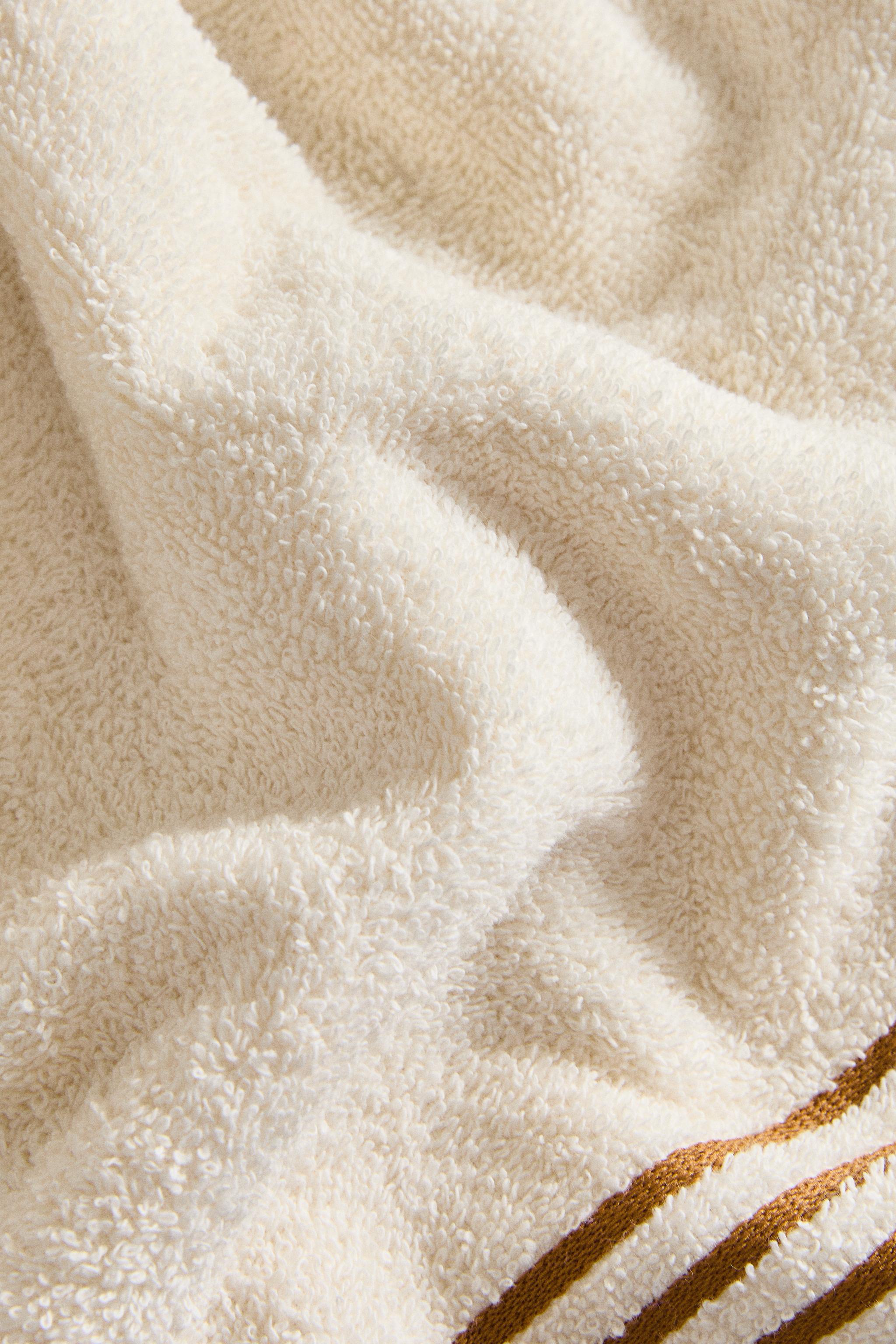 BATH TOWEL WITH STRIPED BORDER